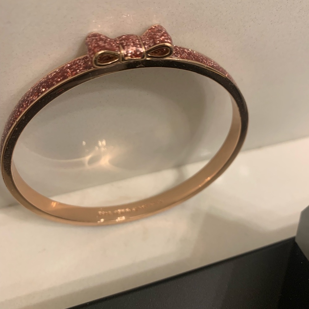 Kate Spade pink glitter bow bangle